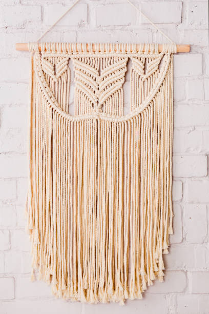 istock Closeup of a macrama hanging on a wall 2179821477