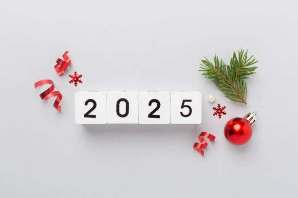 istock 2025 with confetti and decor on color background, top view 2179823205