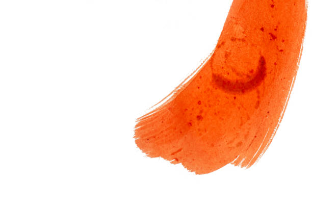 Abstract red watercolor brush strokes on white background.