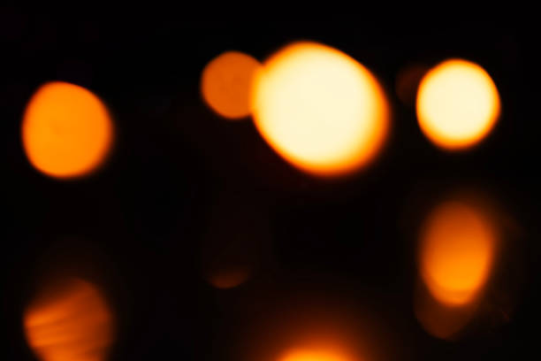 istock Abstract blurred warm bokeh lights against a dark background. 2179826122