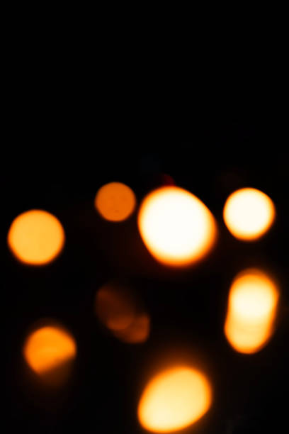 istock Abstract blurred warm bokeh lights on a dark background 2179826123