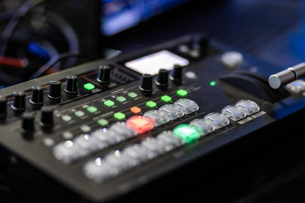 istock Control panel featuring buttons and knobs used for audio mixing and sound management in a recording studio setting 2179835704