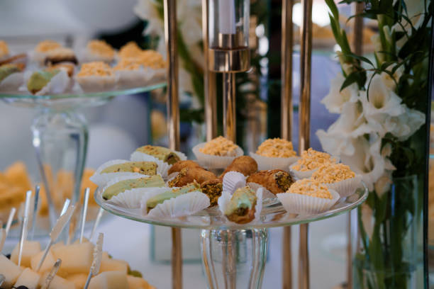 istock Elegant Dessert Buffet with Assorted Pastries and Floral Decor at Sophisticated Event 2179835832