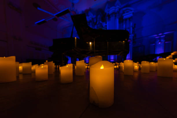 istock blurred symphonic orchestra on stage with lots of candles 2179838532