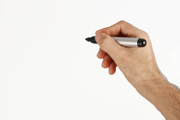 istock A man writing with black color marker isolated on white. Space for text. 2179842662