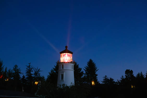 istock Umpqua Lighthouse Oregon glowing in the night 2179845488