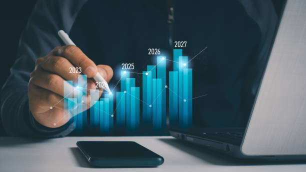 istock Yearly financial report, chart with years data statistics, company progress and growth by year. Businessman analyzes profitability of working companies with digital augmented reality graphics. 2025. 2179851411