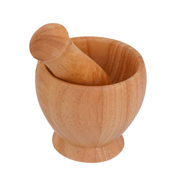 istock wooden mortar and pestle for grinding isolated on white background 2179855224