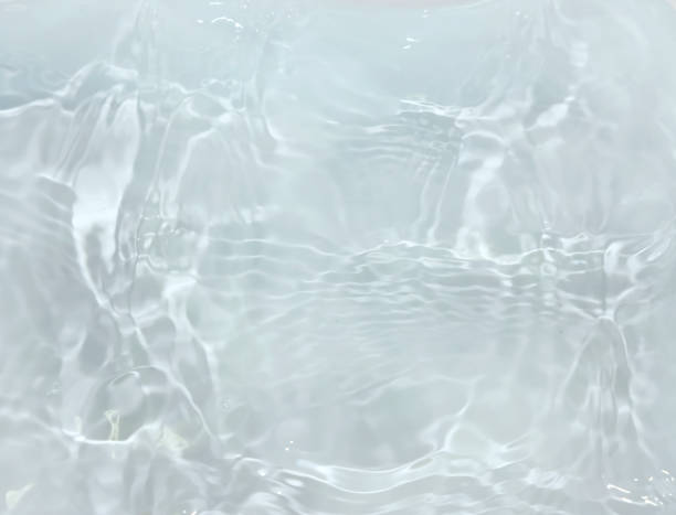 istock Close up of water surface with ripples and reflections. 2179861527