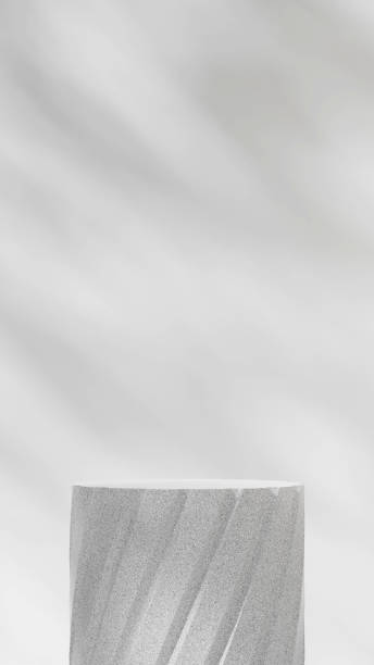 istock mockup scene white granite round podium in portrait with white wall and shadow 3D image render 2179865382