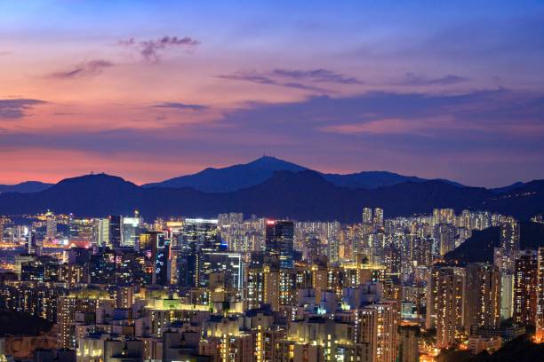 istock Vibrant Cityscape at Dusk with Mountain Backdrop at Magic Hour, Hong Kong 2179868036