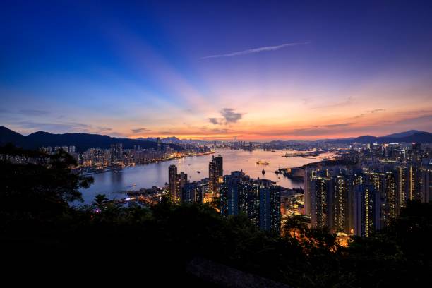 istock Sunset Magic Hour Over Vibrant Hong Kong Skyline and Harbor 2179868037
