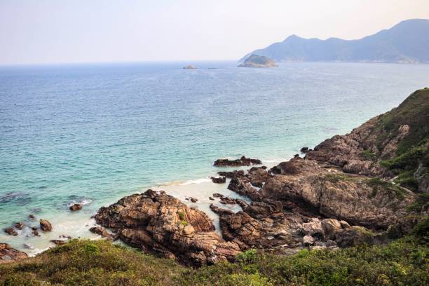istock Rocky Shoreline with Turquoise Ocean Waves Crashing 2179869911