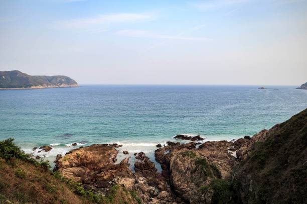 istock Rocky Shoreline with Turquoise Ocean Waves Crashing 2179869922