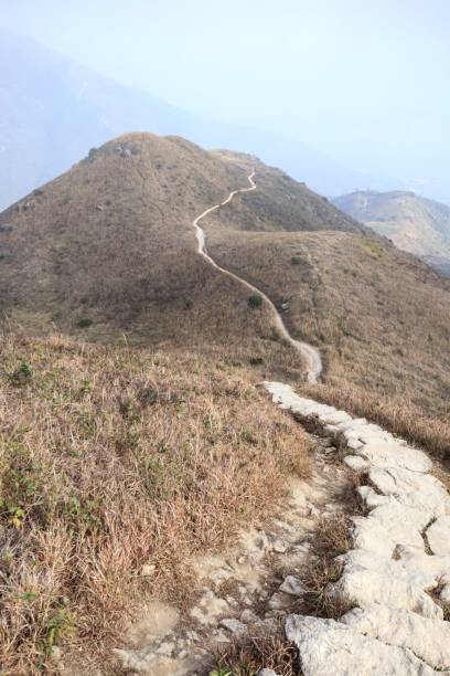 istock Narrow Mountain Ridge Trail Leading to the Summit 2179870295