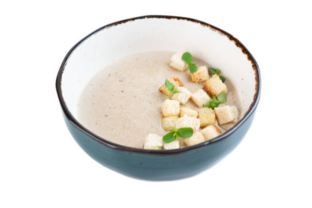 istock Mushrooms Soup with crackers isolated on white background top view 2179870559
