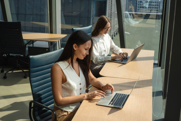 istock Businesswomen working in a modern office 2179872903