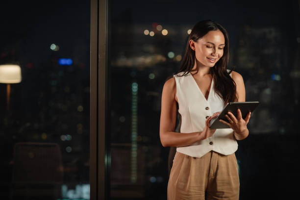 istock Businesswoman using tablet in the modern office 2179872951