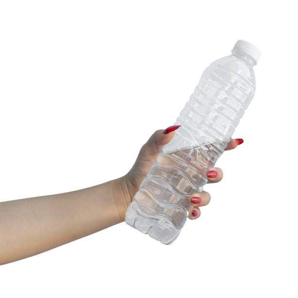 istock Female hand holding water bottle isolated on white background - clipping path. 2179874415