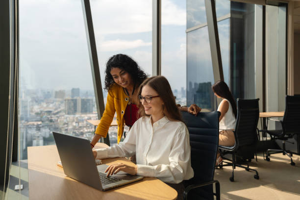 istock Businesswomen collaborating on a project 2179874700