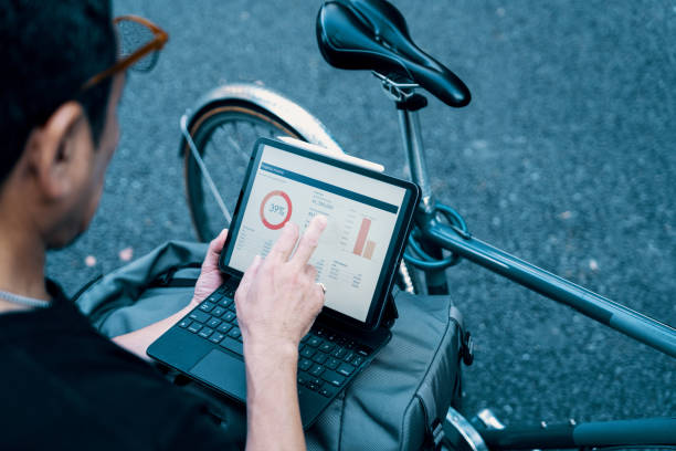 istock Mature businessman using a digital tablet in a city park 2179880166