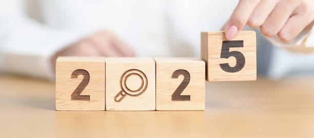 istock 2025 block with magnifying glass icon. SEO, Search Engine Optimization, hiring , Advertising, Idea, Strategy, marketing, Keyword, Content and New Year start concepts 2179887958