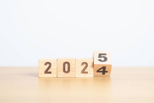 istock 2024 change to 2025 year block on table. goal, Resolution, strategy, plan, start, budget, mission, action, motivation and New Year concepts 2179888145