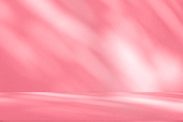 istock Wall interior background, studio, and backdrops show products. with shadow from window color white and pink light. background for text insertion and presentation of product 2179894922