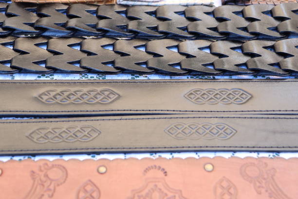 A diverse collection of leather straps that showcase a wide variety of intricate designs and fascinating textures