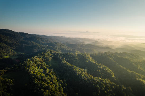 istock Mountains and mist in the morning 2179895563
