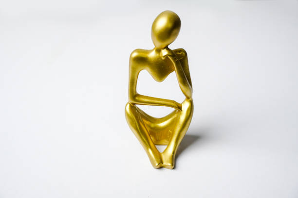 Thinking Concept. waiting for someone. Golden structure shape of thinking human.
