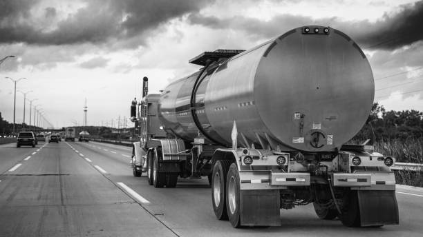 istock A giant truck speeding up along the interstate at sunset 2179899313
