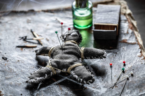 istock Voodoo doll, stabbed with a needle, burns and poisoned 2179900644