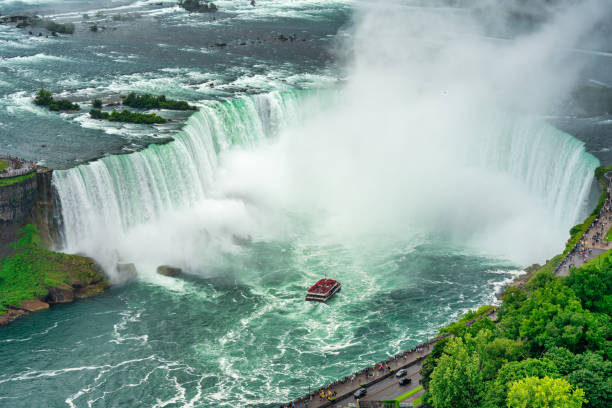 istock Boat cruise under Niagara Falls, aerial view 2179900813