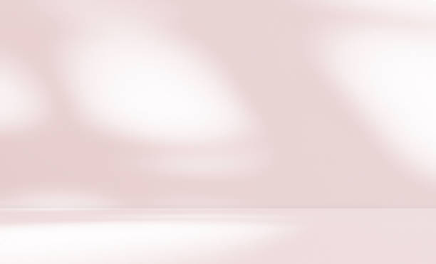 istock Empty pink colour room studio with sunlight effect shadow on the floor and wall for product presentation. 2179901537