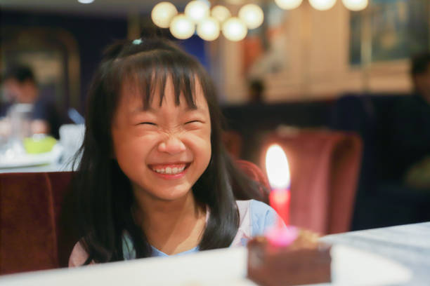 Shot of a happy young girl celebrating her birthday