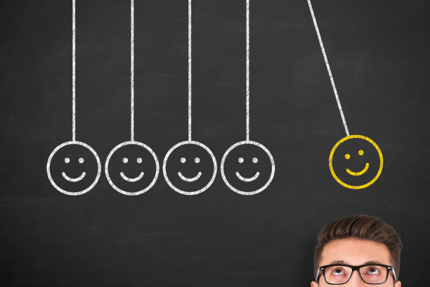 istock Unhappy and Happy over Human Head on Blackboard. 2179903067