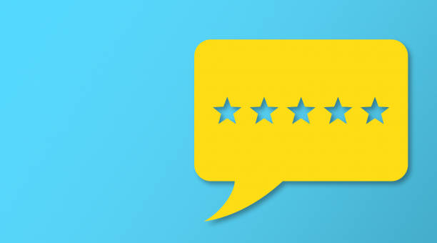 istock Feedback Concept - White Chat Bubble With Cut Out Star Shapes On Blue Cardboard Background. 2179903892