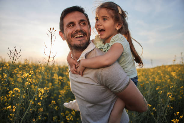 istock Father and daughter enjoying nature 2179904523