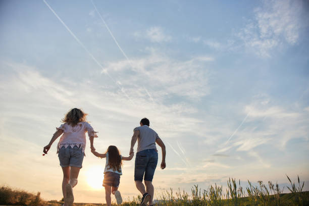 istock Young family enjoying nature 2179904636