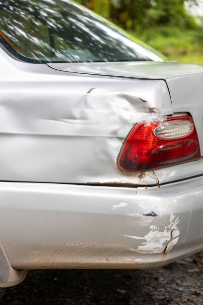 istock Dreaded scratch down the side car get damaged from accident on the road. Vehicle bumper dent and taillight broken by car crash. 2179906287