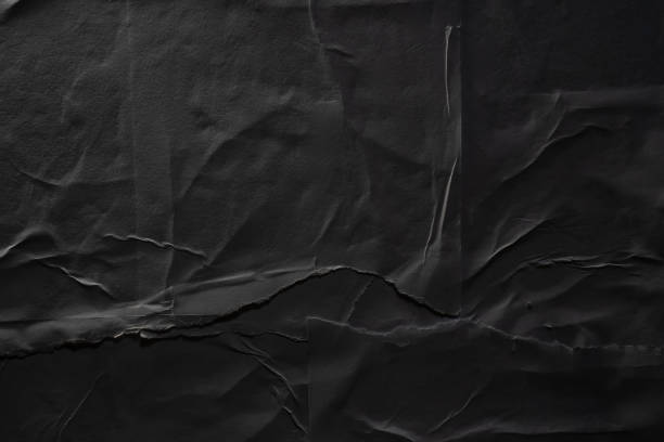istock Abstract peeled black paper poster texture background 2179910183