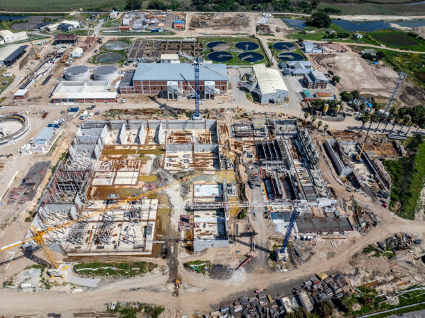 istock Construction of water treatment plant next to river 2179913344