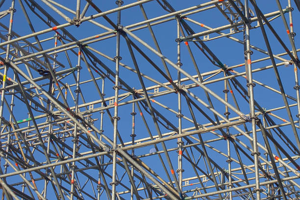 istock metal scaffolding against the blue sky 2179922980