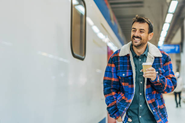 istock A mid-adult, handsome man at the  train station. 2179926663