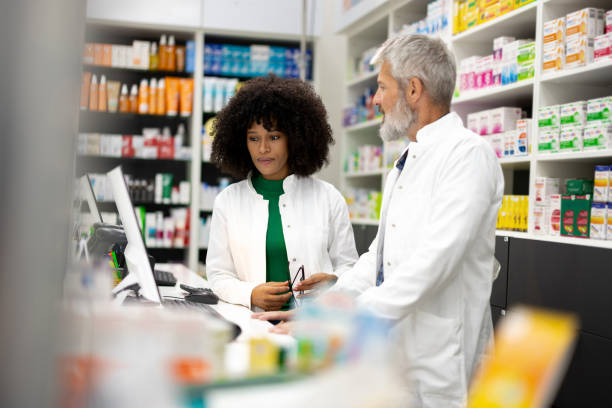 istock Two pharmacist planning the work of their pharmacy 2179926806