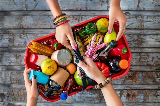 istock Red shopping basket with assorted grocery products. 2179942543