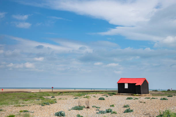 Red Roofed Hut where River Rother ends in Rye Bay