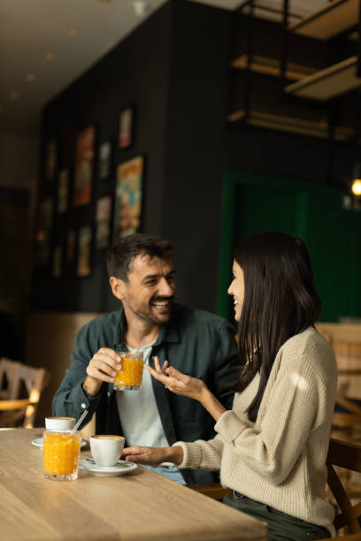 istock Young couple enjoying their time together in a cafe 2179948525