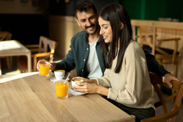 istock Young couple enjoying their time together in a cafe 2179948792
